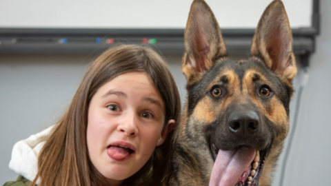 Robyn Birdsell and a police dog named after her