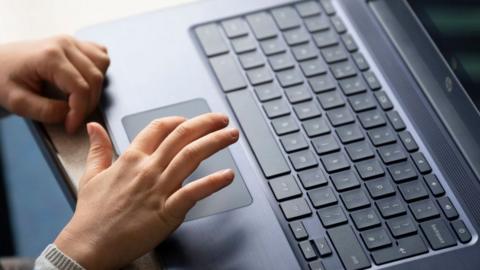 Child using laptop