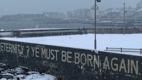 'eternity ye must be born again' painted on seawall