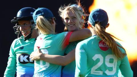 Sophia Smale and Oval Invincibles celebrate a wicket
