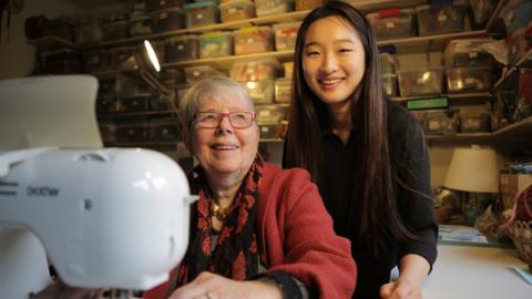 Monique and Mikyoung working on their patchwork