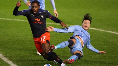 Coventry City midfielder Callum O'Hare tangled with Luton Town's Pelly Ruddock Mpanzu at St Andrew's