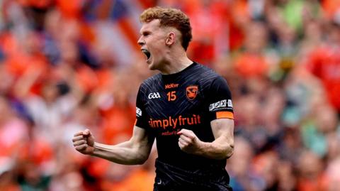 Conor Turbitt celebrates an Armagh point