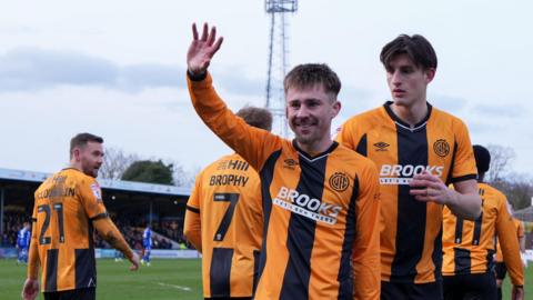 Ben Knight of Cambridge United celebrates his second goal against Bristol Rovers with team-mates