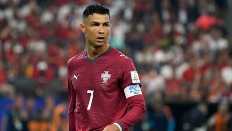 Cristiano Ronaldo looks on