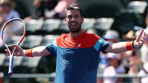 Cameron Norrie celebrates