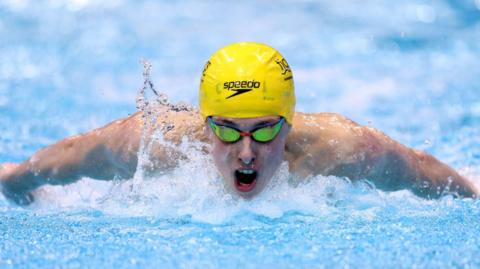  Filip Nowacki of Tiger Jersey competes in the Mens 400IM heats 