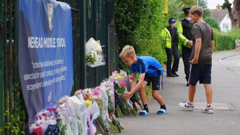 Tributes outside school