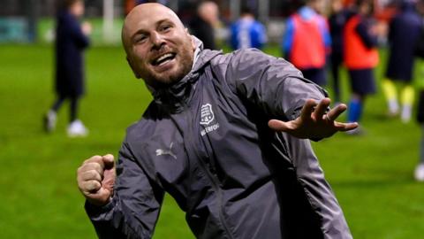 Matt Lawlor celebrates after a game as interim manager of Waterford