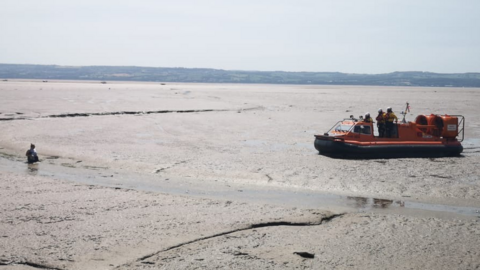 Woman stuck in mud off Hoylake