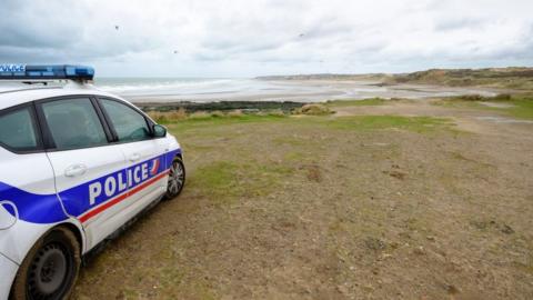 A French police car on a beach