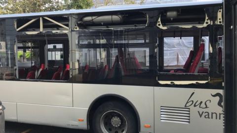 Bus with broken windows