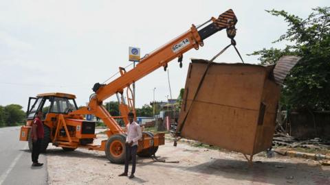 A tea stall demolished by District administration in a demolition drive against the illegal construction in Nuh after the communal violence on August 7, 2023 in Mewat, India.