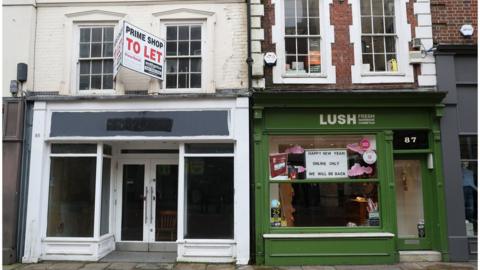 A closed shop next to one that has moved online