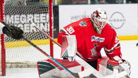 Cardiff Devils keeper Mac Carruth makes a save against Glasgow Clan in the playoff quarter-finals