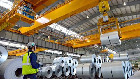 This handout photo taken on September 4, 2013 shows a worker at the picking line at the industrial plant in Pesqueria, Nuevo Leon state, Mexico.