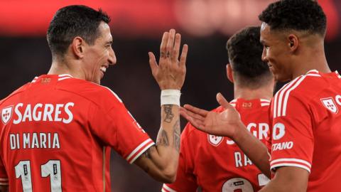 Angel Di Maria and David Neres celebrate