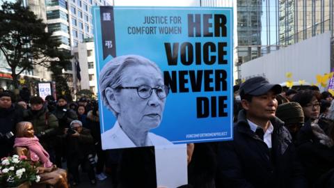People patcipate on a funeral service of Kim Bok-dong, 92, a former sex slave to the Japanese Imperial Army during the war, in front of Japanese embassy on February 01, 2019 in Seoul, South Korea