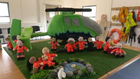 Knitted air ambulance and crew