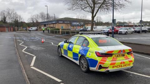 Police at the scene of crash at Wyvern Retail Park