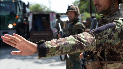 Afghan Army member at a checkpoint in Jalabad after a IS attack earlier this month