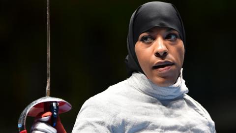 Ibtihaj Muhammad was the first athlete from the United States to compete at the Olympics wearing the hijab when she took part in the fencing at Rio 2016