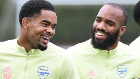 Trae Coyle (left) and Alex Lacazette