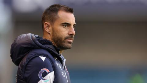 Reading boss Ruben Selles directs his players from the touchline during a League One match.