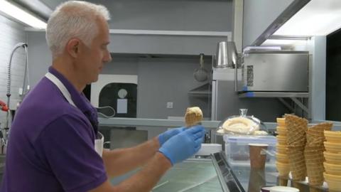 Gavin Murray serving icecream