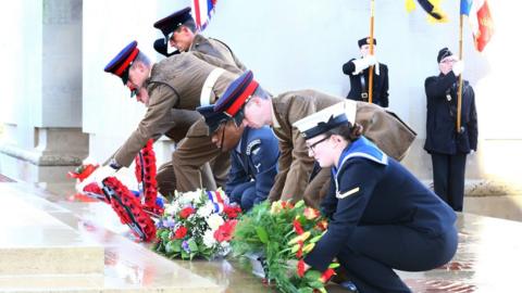 Soldiers lay wreaths at the Thiepval Memorial