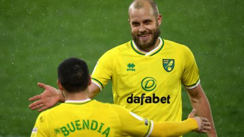 Emi Buendia and Teemu Pukki celebrate