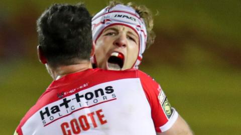 Theo Fages celebrates his drop-goal winner for St Helens