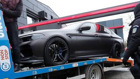 Romanian police seize luxury vehicle from Andrew Tate's compound