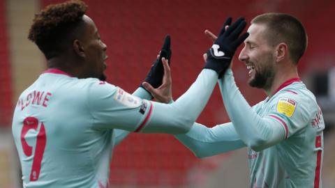 Conor Hourihane (right) celebrates with Jamal Lowe (left)