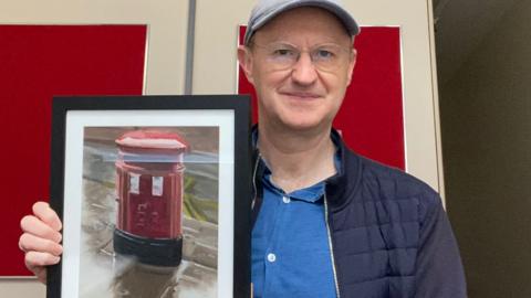 Mark Gatiss with his painting