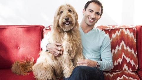 Aaron Hirschhorn and his golden labradoodle Rocky