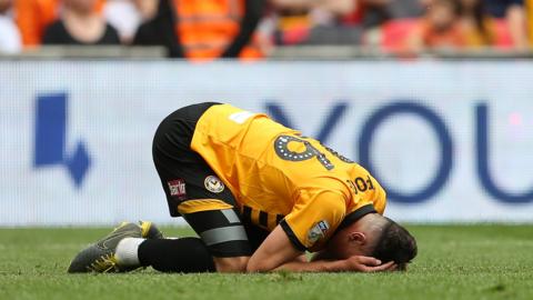 Newport defender Regan Poole is distraught