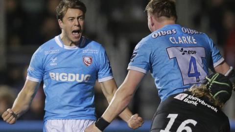 Gloucester celebrate winning at Saracens