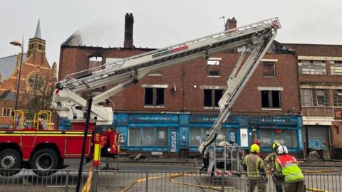 Firefighters at the scene of a fire in Birmingham