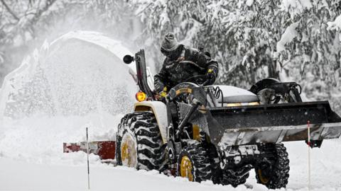 A snowplough in Buffalo, New York, 26 December