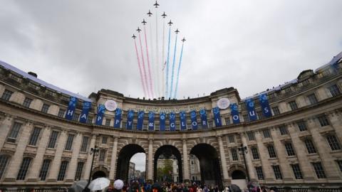 The Red Arrows perform a flypast over Buckingham Palace for the King's coronation