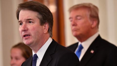 Supreme Court nominee Brett Kavanaugh (L) speaks as US President Donald Trump