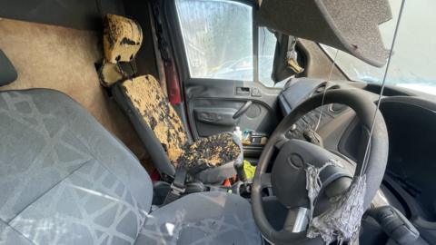 Burned interior of van