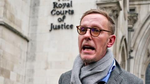 Laurence Fox makes a statement outside the the Royal Courts Of Justice, central London