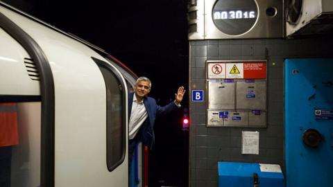 Sadiq Khan on a train