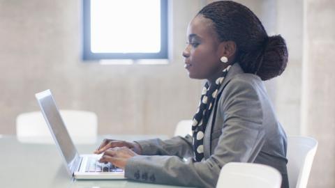 Woman working on a laptop