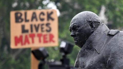 Statue of Churchill in Parliament Square with Black Lives Matter sign