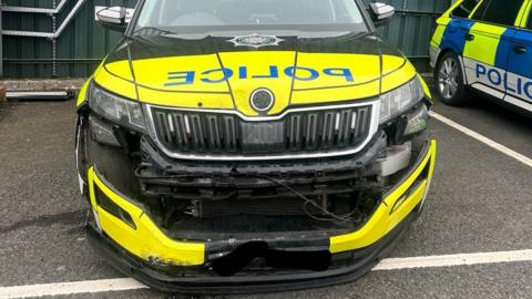 PIcture shows bumper damage to PSNI car