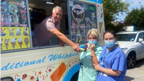 Photo of hospital staff in Doncaster getting treats from ice cream van