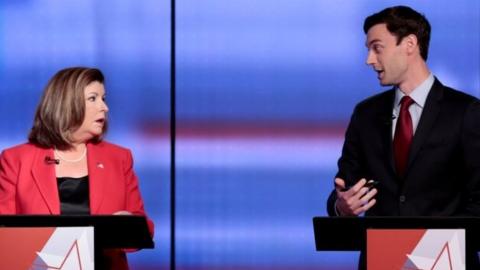 Republican candidate Karen Handel and Democratic candidate Jon Ossoff appear in a special election debate.